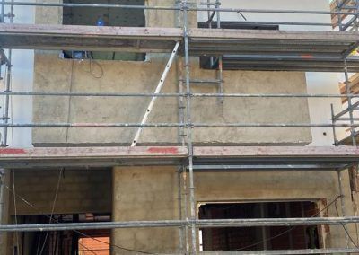 01-fachada-obra-nueva-vivienda-medianeras-construccion-valencia-dv4-empresa-constructora